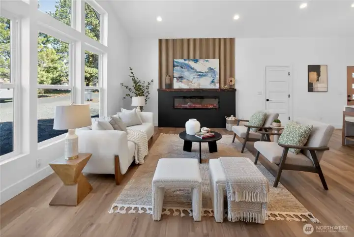 Cozy up with the electric fireplace & stunning accent wall