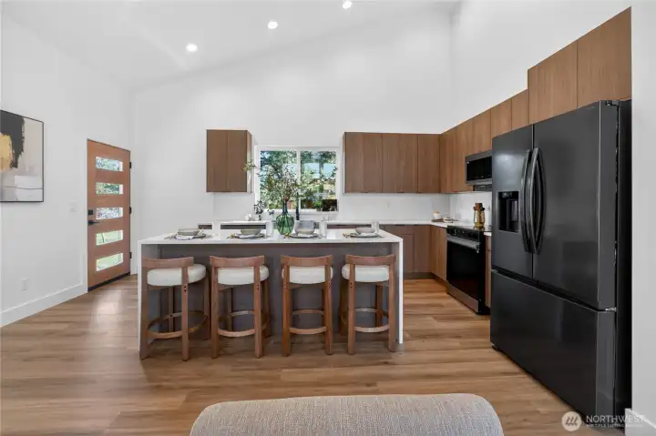 Neutral colored cabinets & modern stainless steel appliances