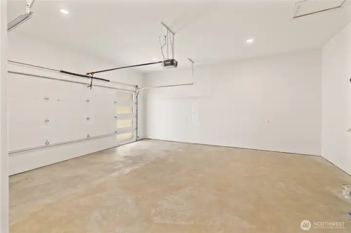 Ample garage space provides room for vehicles as well as additional storage for outdoor gear.