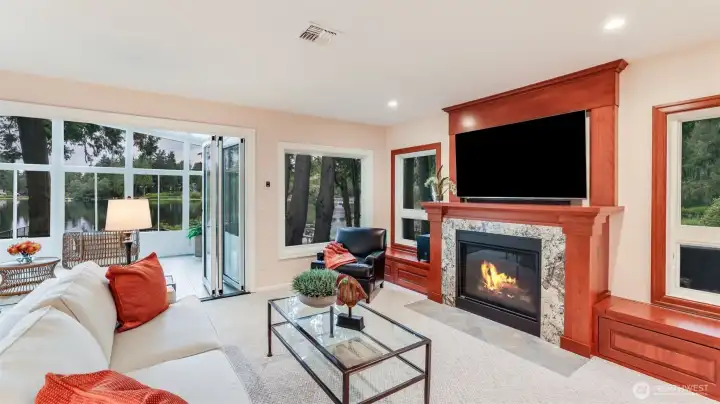 Next to the fireplace there are 2 very useful custom built storage features.