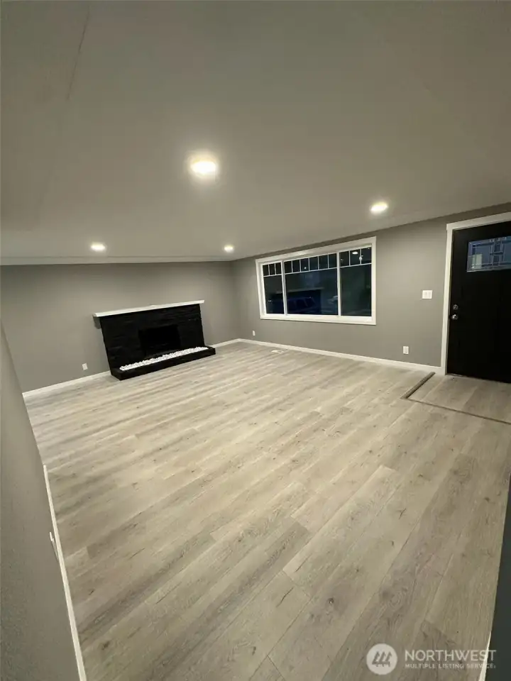 Front entry, looking at fireplace
