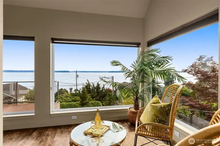 Peaceful sitting room with water views on the West facing side and garden views when you turn east