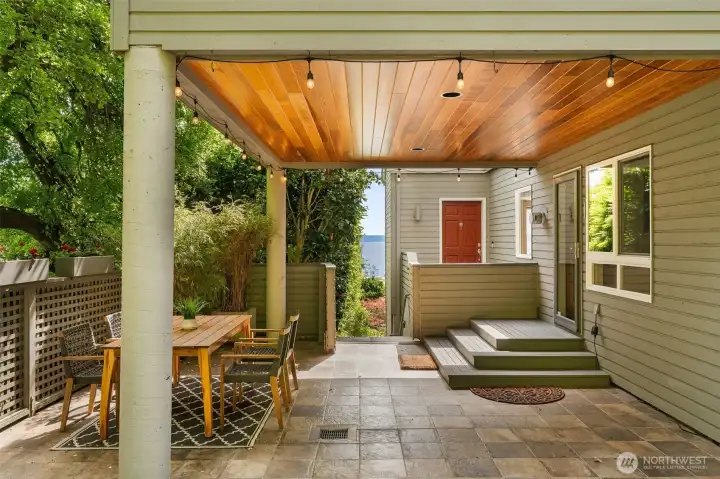 Private outdoor patio with water & garden views