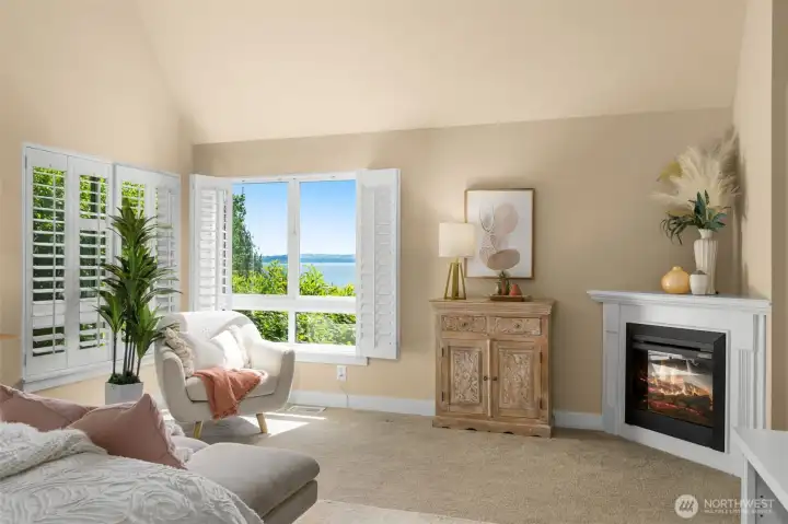 Great view from the primary suite & a fireplace for chilly nights