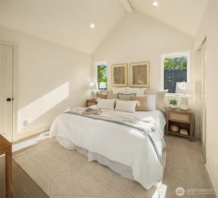 Primary suite on the 2nd floor. Vaulted ceilings and wonderful natural light