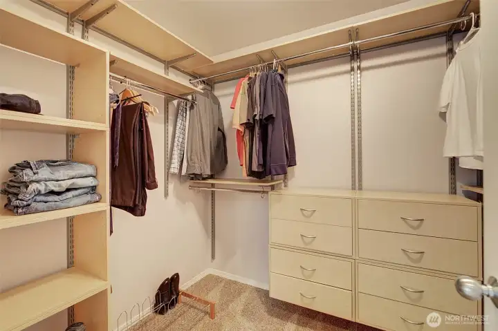 Primary walk-in closet Primary walk-in closet