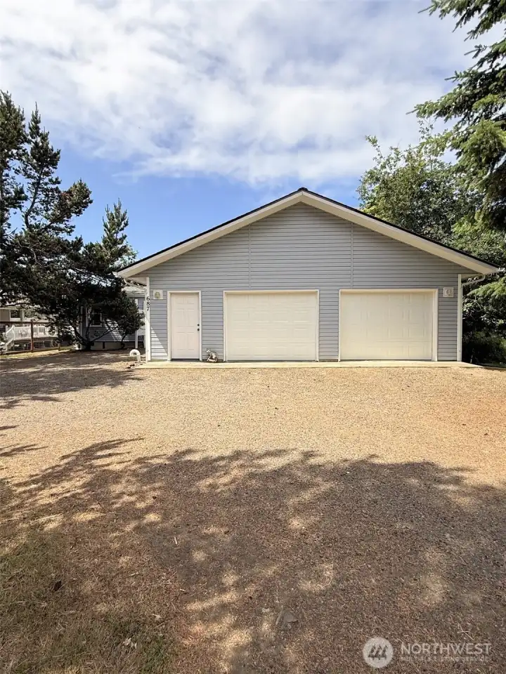 Covered walkway with ramp to the garage!