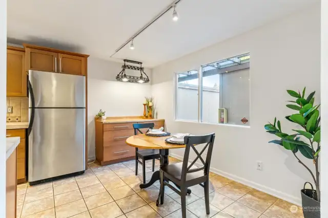 Kitchen has lots of space for your breakfast table and more cabinets!