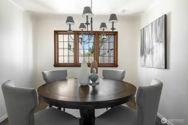 The dining room conveniently located in between the kitchen and living room areas.