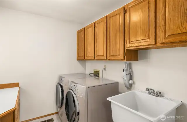 Laundry room on main with tons of storage!