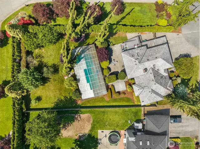 Expansive double lot with heated swimming pool!