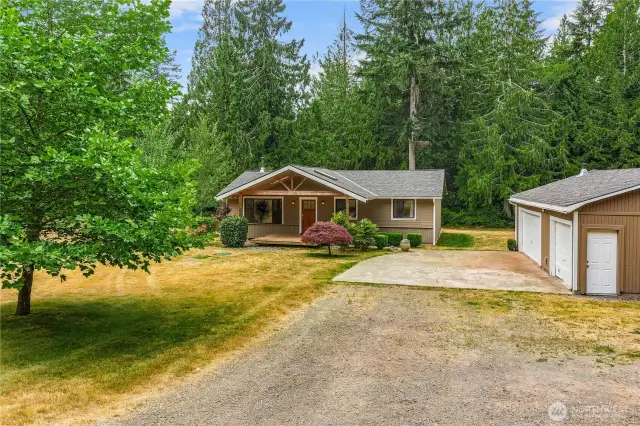 Plenty of paved driveway parking by 3+ car garage