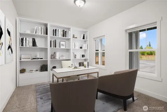 Front-facing office with plush carpeting, ample natural light, and a quiet setting perfect for working from home. Virtually staged.