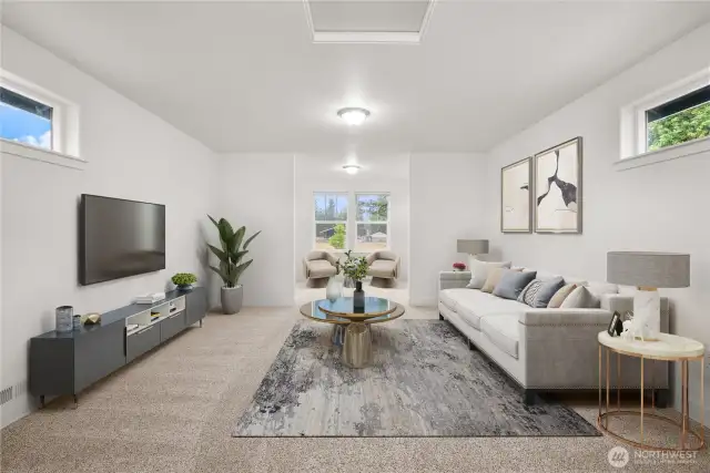 Expansive bonus room above the garage with plush carpeting, multiple windows for natural light, and endless possibilities for use including: additional loft bedroom, extra office space, game room, or media room. Virtually staged.