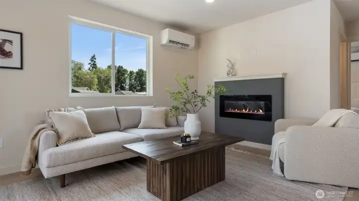 Great Room with cozy fireplace and mini split for year around comfort.