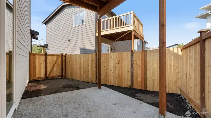 Back yard is fully fenced with access gate.