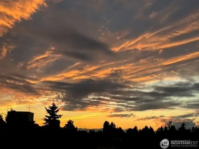 A great feature of Unit #45, is being on the quieter side of the complex facing the West with sunset views from your private balcony off the living room.