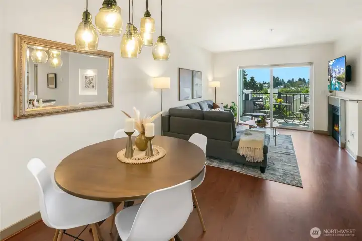 Dining space with open space to living room.