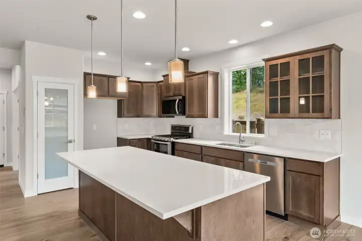 Large island is perfect for prepping food or entertaining!