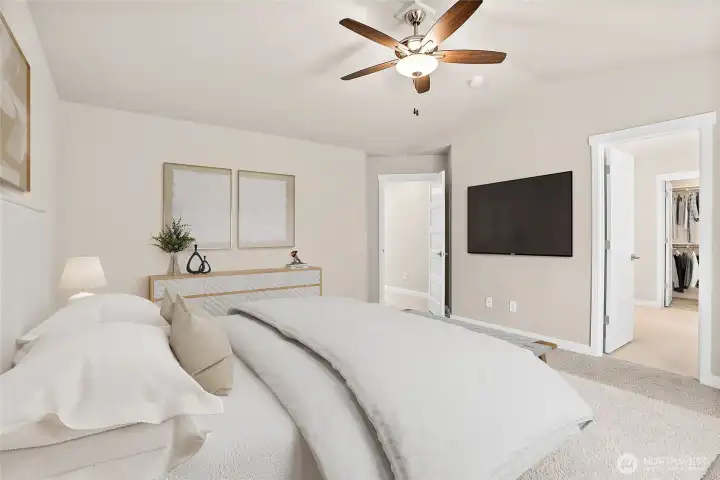 Virtually staged primary bedroom for illustration only.