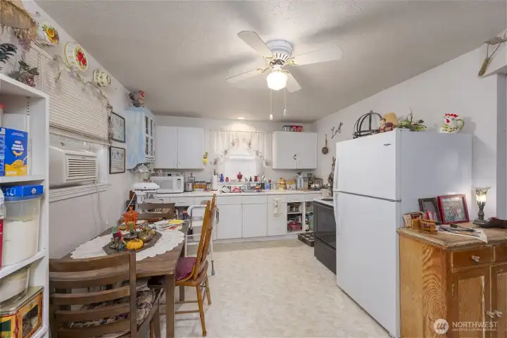 Large kitchen space with access to fully fenced back patio