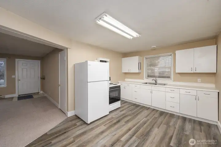 Huge kitchen with update flooring.