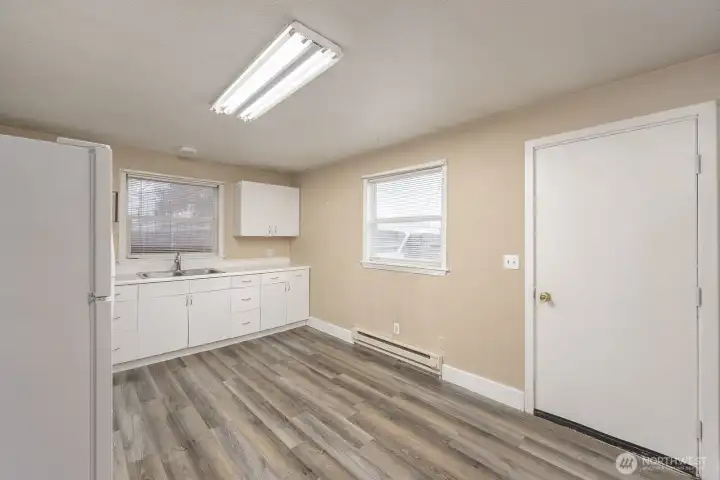 Kitchen access to fully fenced isolated patios in both units.