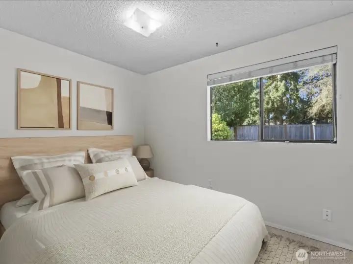 3rd bedroom - virtually staged. Ideal for bedroom or work-from-home office