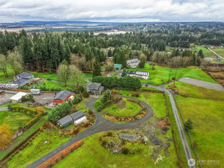 ARIEL VIEW OF PROPERTY WITH POND