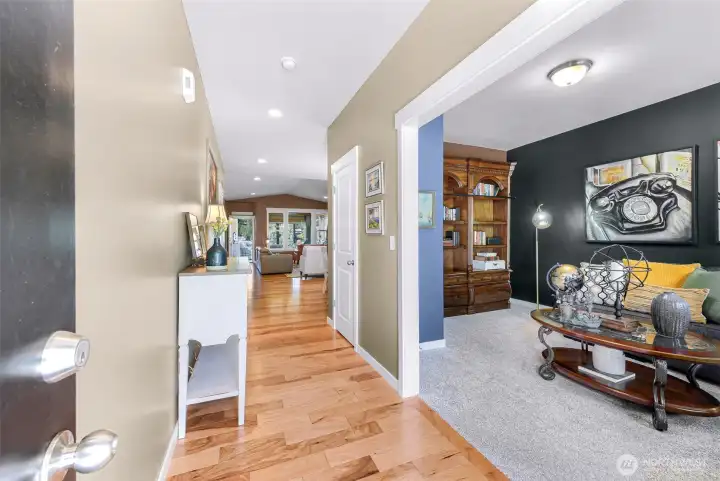 As you enter the home you are welcomed by warm tones and engineered hardwood flooring, an office that could be converted to 3rd bedroom is located just inside the front entry....