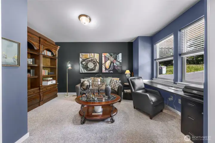 This large office with bright natural light is located just inside the main entry of home, could be easily converted into a 3rd bedroom as this was in the original builder plans.