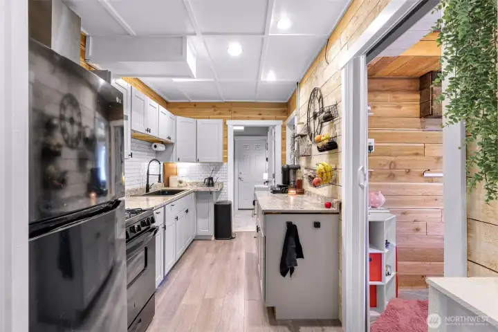 Lower level ADU full kitchen with full sized appliances and large farm style sink