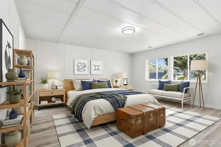 Master bedroom suite with vaulted ceilings, new LVP flooring, walk in closet and updated 4 piece bathroom - virtually staged photo