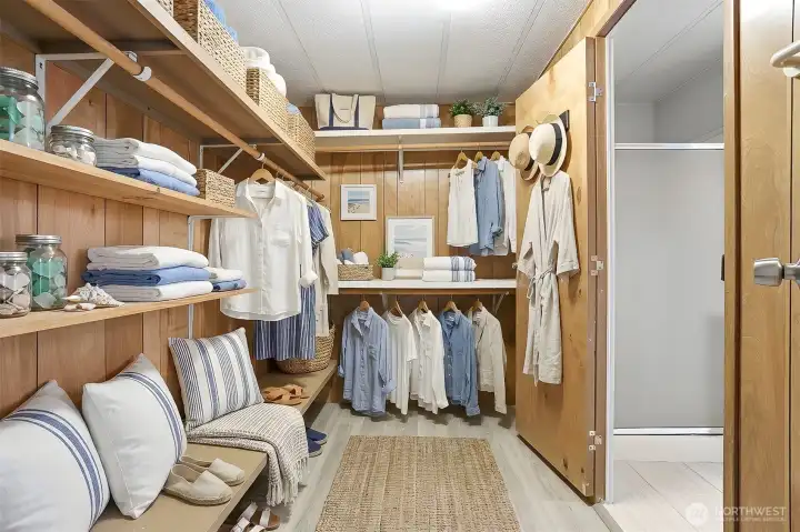 Master bedroom suite with vaulted ceilings, walk in closet and updated 4 piece bathroom - virtually staged photo