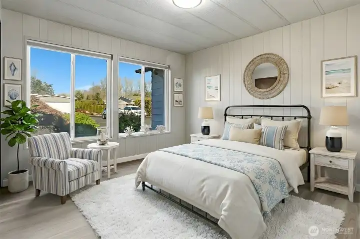 2nd bedroom with new LVP flooring - virtually staged photo