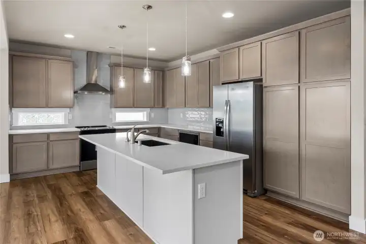 Soft Close Cabinetry + SS Appliances + Sleek Lighting