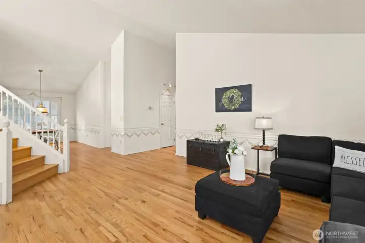 Charming wooden shutters filter the cascading light into home.