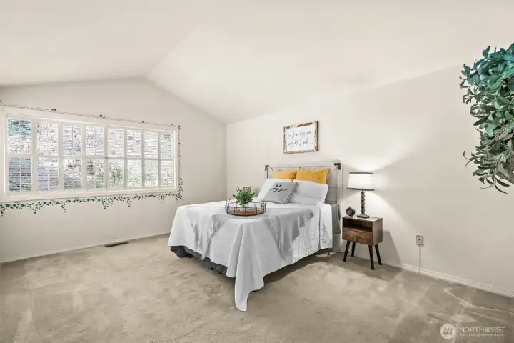 Windows allow natural light to shine and wood interior shutters work remarkably well to keep room nice and dark when sleeping in.