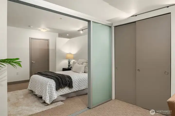 Primary bedroom and den-office