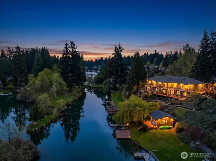 An exceptional 350-foot waterfront estate offering two private docks a dedicated boat launch for seamless access to the water. The cabana which has water and electricity provides a refined retreat, ideal for entertaining or enjoying peaceful moments in a breathtaking setting.