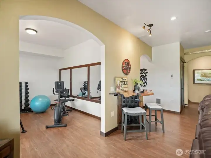 This room is perfect for a dedicated workout area.  It has been plumbed for a 2nd kitchen which would be ideal for summer entertaining.