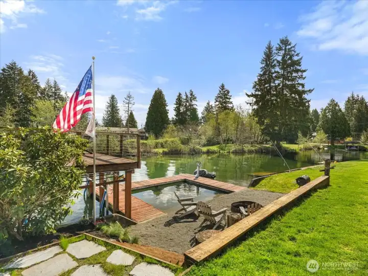 Have a real wood fire lakeside and across on the spit is another large firepit with water spigot.