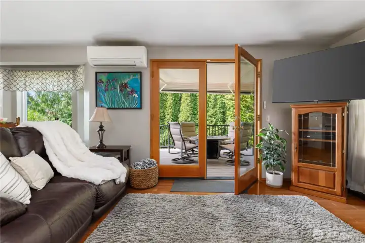 French doors leading out to backyard - did I mention this home has air conditioning?