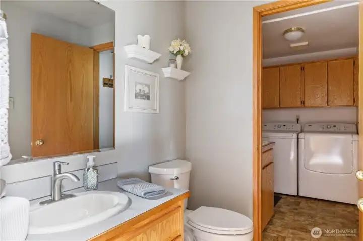 Convenient half bath and utility area on the main floor