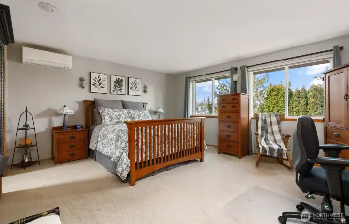 Primary suite with walk-in closet and 3/4 bath