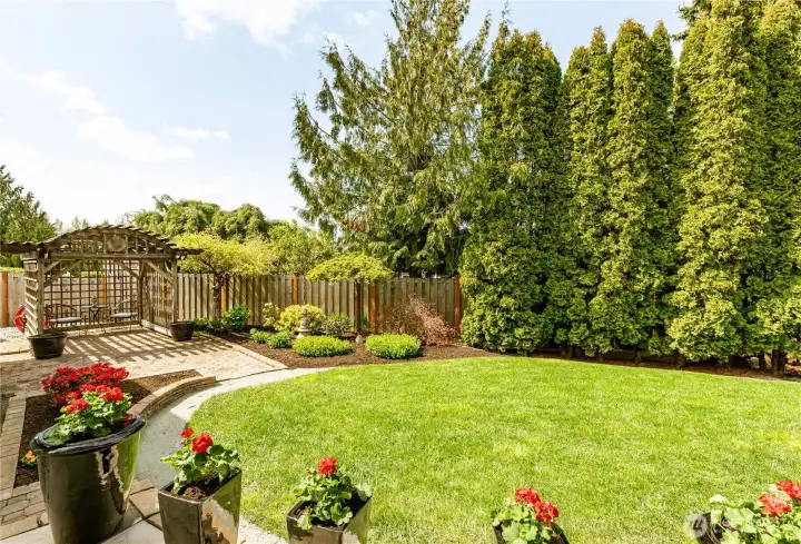 Can you see yourself relaxing in this lovely backyard?