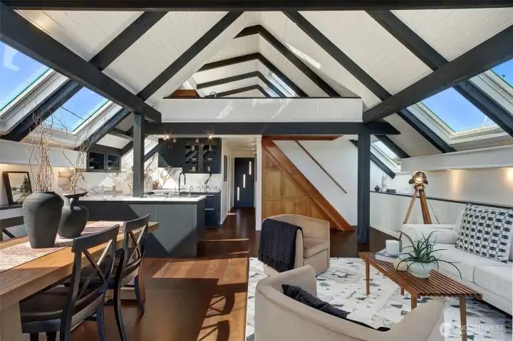Looking back at the front door from the lake side, the quality of construction is excellent from the cherry hardwood floors to the multiple remote control skylights above.