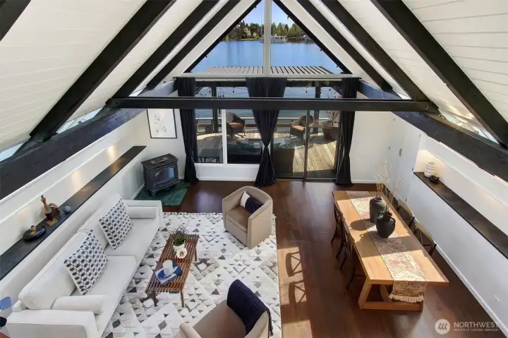 The flat triangular end walls (the front and rear facades) provides massive, floor-to-ceiling windows to maximize natural lighting and scenic views.