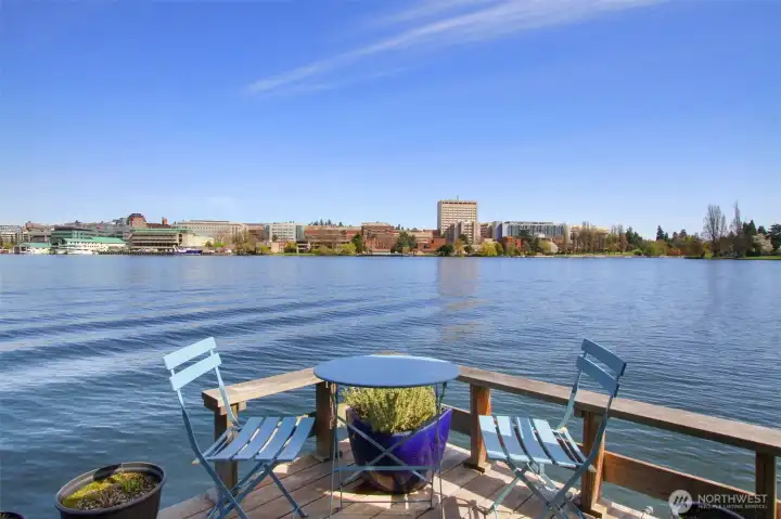 Views of the Queen City Yacht Club, Montlake Bridge, UW Bridge, Montlake Cut, and Cascade Mountains are exceptional from the deck.