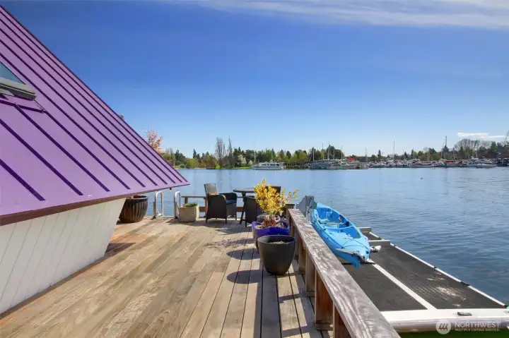 The deck wraps to the East and makes the perfect spot to make your potted garden or store kayaks.